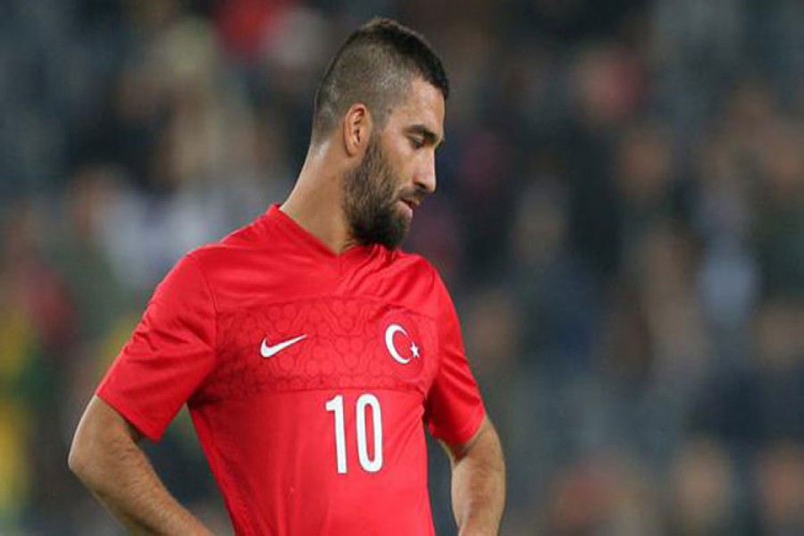 barcelona midfielder arda turan announces turkey retirement