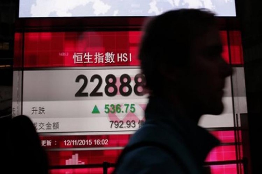 Asian shares slip again