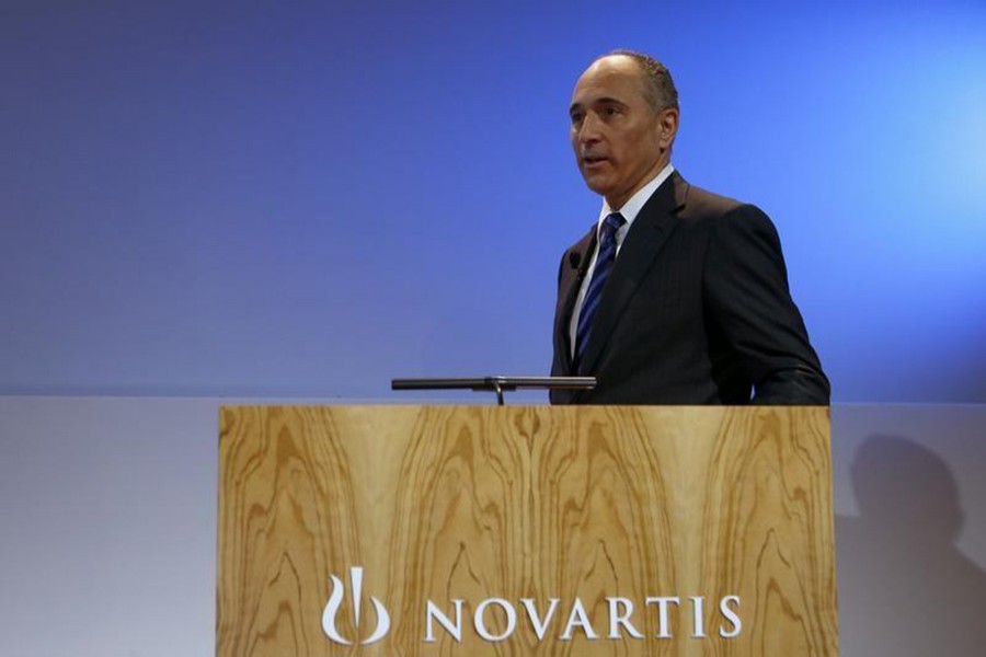 CEO Joseph Jimenez of Swiss drugmaker Novartis arrives to address the company's annual news conference in Basel on January 29, 2014. - File photo