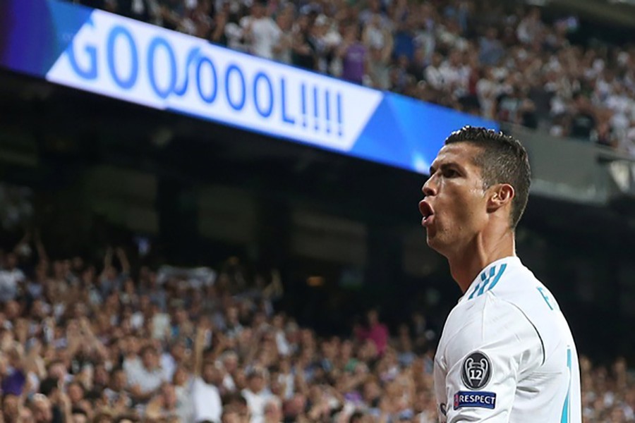 Real Madrid’s Cristiano Ronaldo celebrates scoring their first goal on Wednesday against APOEL. - Reuters photo