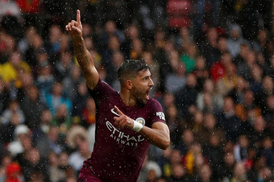 Manchester City's Sergio Aguero celebrates scoring their first goal during Saturday's clash against Watford. - Reuters photo