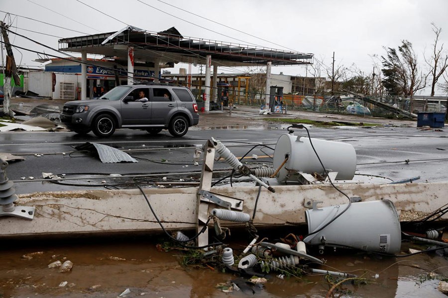 Damaged electrical installations are seen after the area was hit by Hurricane Maria en Guayama, Puerto Rico on Wednesday. - Reuters photo