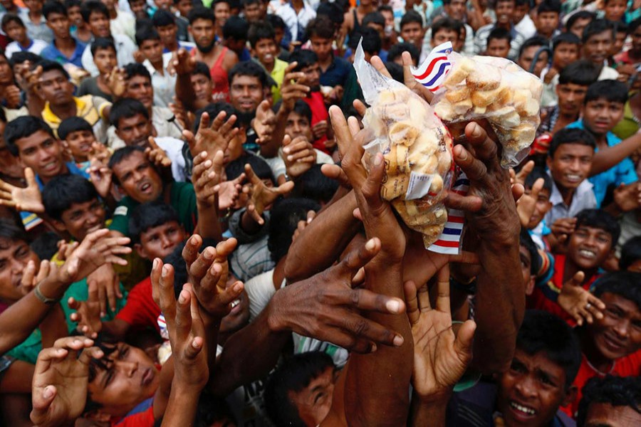 Rohingya refugees jostle for aid in Cox's Bazar, Bangladesh on Wednesday. - Reuters photo used for representation.