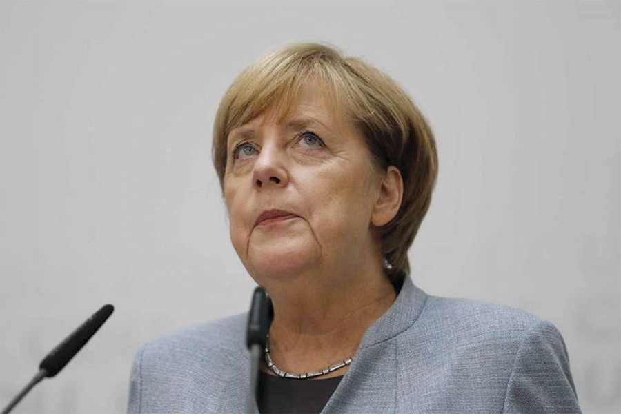 GERMAN CHANCELLOR ANGELA MERKEL PONDERS DURING A PRESS CONFERENCE AFTER A BOARD MEETING OF THE CHRISTIAN DEMOCRATIC UNION CDU IN BERLIN, GERMANY, MONDAY, SEPT. 25, 2017.