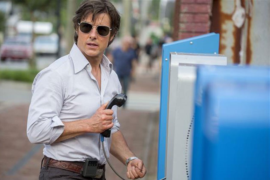 Tom Cruise as Barry Seal in a scene from "American Made." (AP photo)