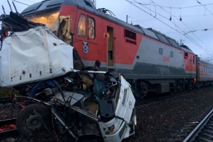 The bus was destroyed by an oncoming passenger train. -Reuters Photo