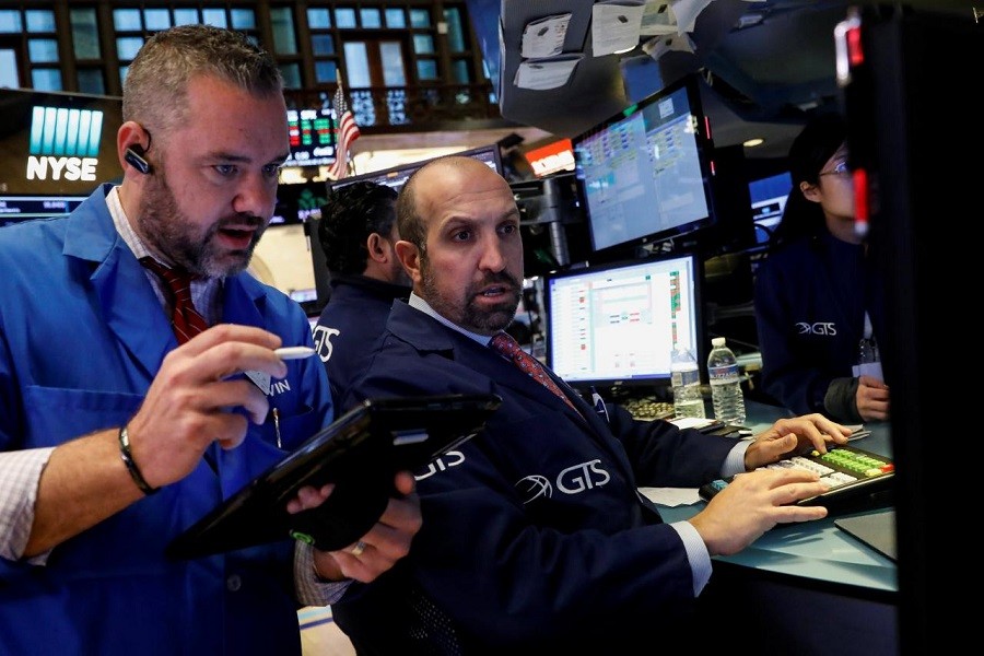 Traders work on the floor of the New York Stock Exchange (NYSE) in New York, US, October 3, 2017. Reuters