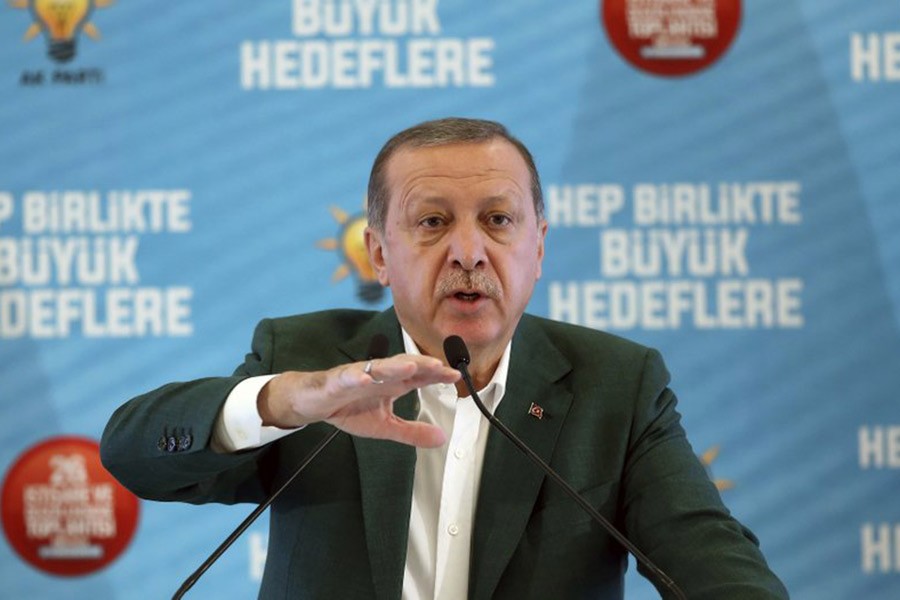 Turkey’s President Recep Tayyip Erdogan, gestures as he delivers a speech at his ruling political party’s conference in Afyonkarahisar province in western Turkey on Saturday. -AP Photo