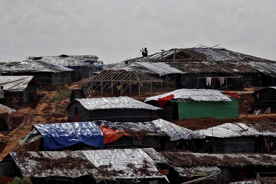 A Rohingya refugee builds a shelter in a camp in Cox's Bazar, Bangladesh, September 21 last. - Reuters file photo