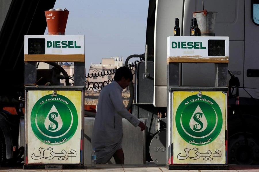 A man walks at a petrol station in Riyadh, Saudi Arabia recently. 	— Reuters