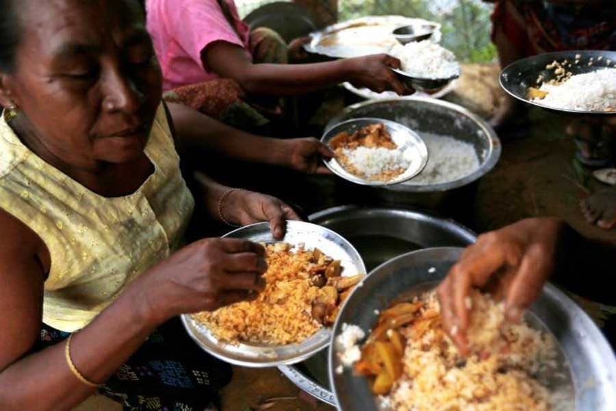 In this file photo, ethnic Rakhine people who fled from Maungdaw after Arakan Rohingya Salvation Army (ARSA) had attacked, eat their meal in Buthidaung, Myanmar.  - Reuters photo