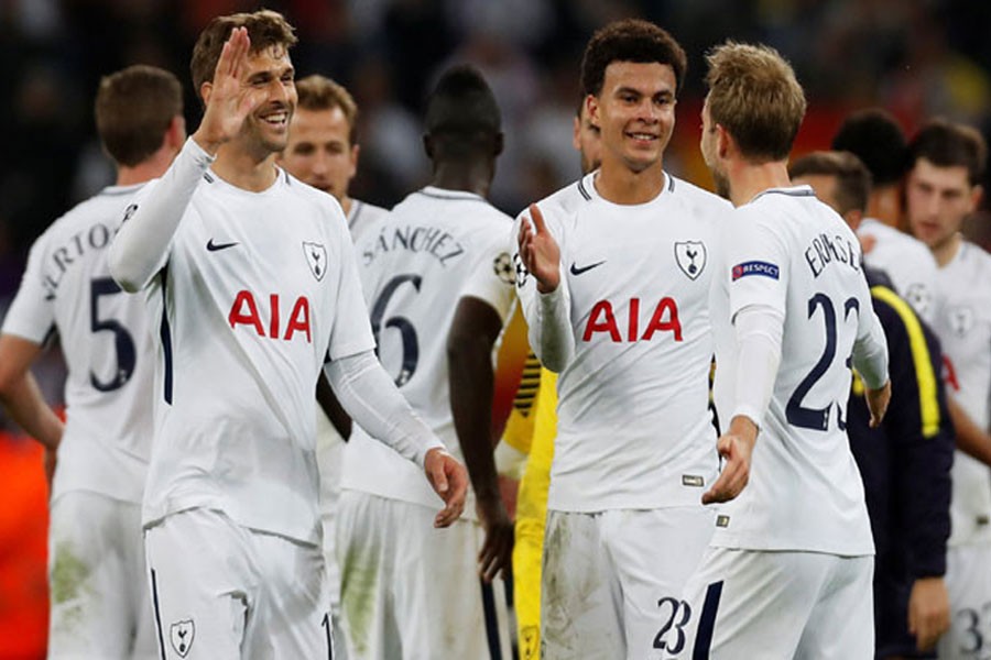 Tottenham's Dele Alli, Christian Eriksen and Fernando Llorente celebrate after defeating Real Madrid (Reuters photo)