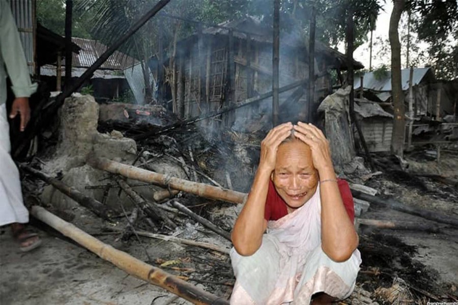 Around 8,000 people on Friday last attacked Hindu-dominated Thakurbari village, and torched some 8-10 houses of the Hindus over a Facebook post. - UNB photo