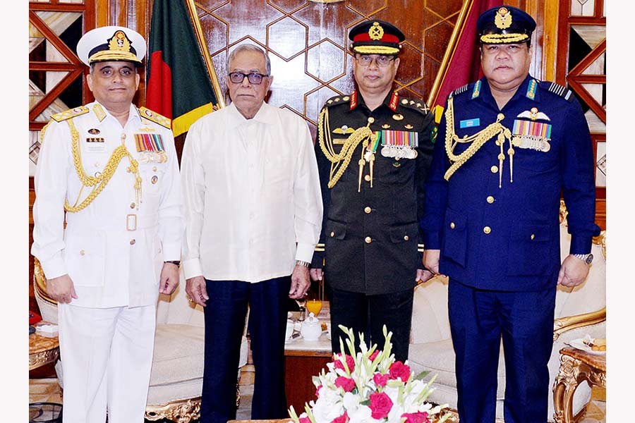 President Abdul Hamid, along with the chiefs of the three services, poses for photographs after a meeting at Bangabhaban on Tuesday. -Focus Bangla Photo