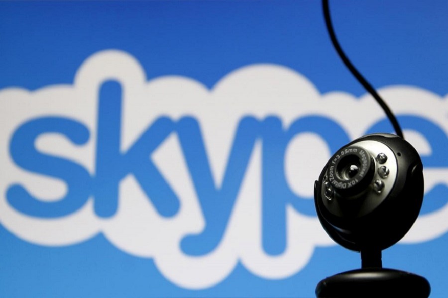 A web camera is seen in front of a Skype logo in this photo illustration May 26, 2015. ReutersFile Photo