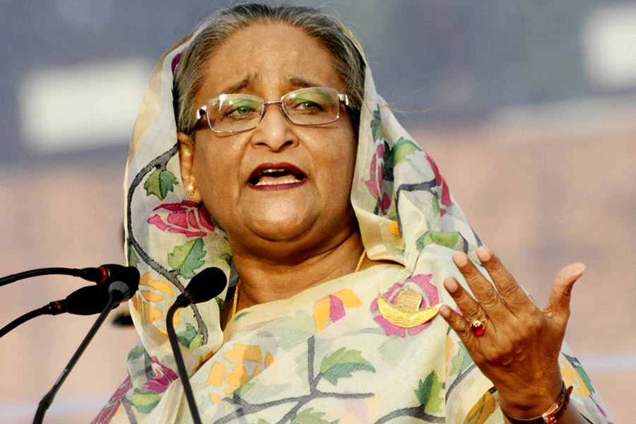 Prime Minister Sheikh Hasina addresses a rally at Suhrawardy Udyan in Dhaka on Saturday. -Focus Bangla Photo