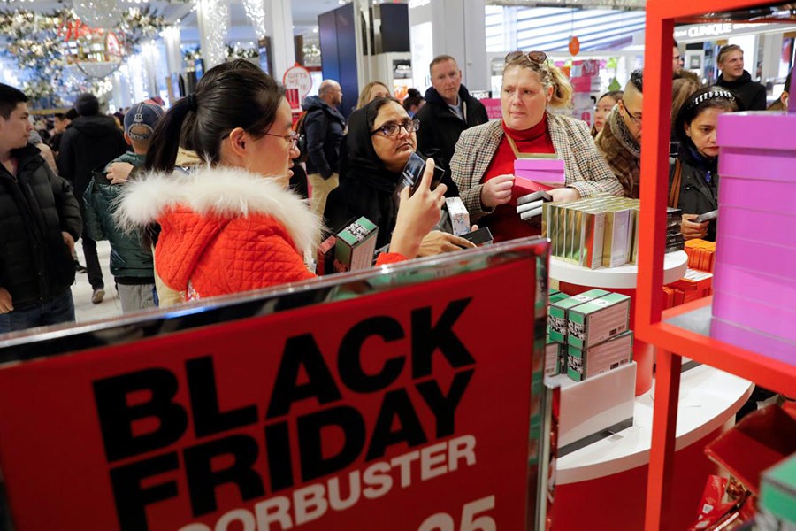 People shop for items in Macy's Herald Square in Manhattan, New York. - Reuters photo