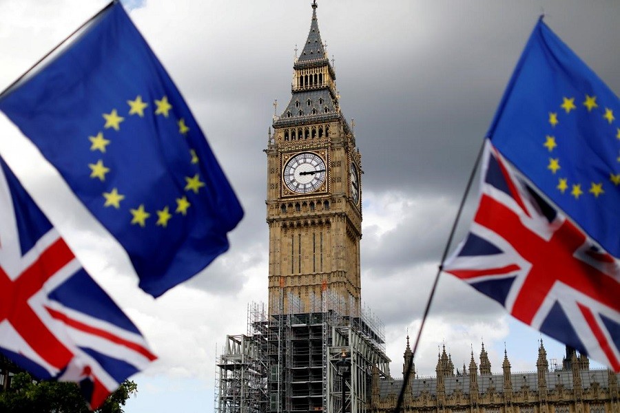 Union Flags and European Union flags fly near the Elizabeth Tower, housing the Big Ben bell, in Parliament Square in central London, Britain, September 9, 2017. Reuters/File Photo