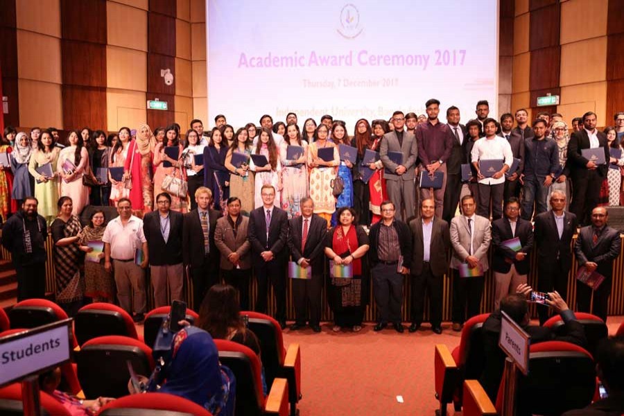 Awardees are seen with the Vice Chancellor at Independent University, Bangladesh.