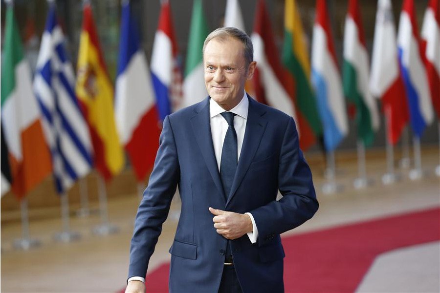 European Council President Donald Tusk arrives at EU headquarters prior to an EU Summit in Brussels, Belgium, Dec. 14, 2017: Xinhua