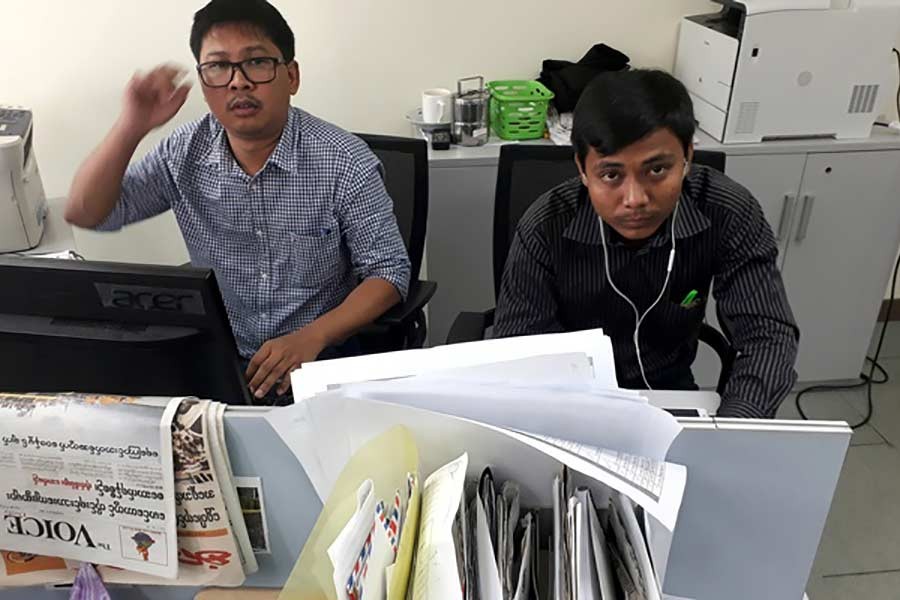 Reuters journalists Wa Lone (L) and Kyaw Soe Oo, who are based in Myanmar, pose for a picture at the Reuters office in Yangon, Myanmar December 11, 2017. - Reuters Photo