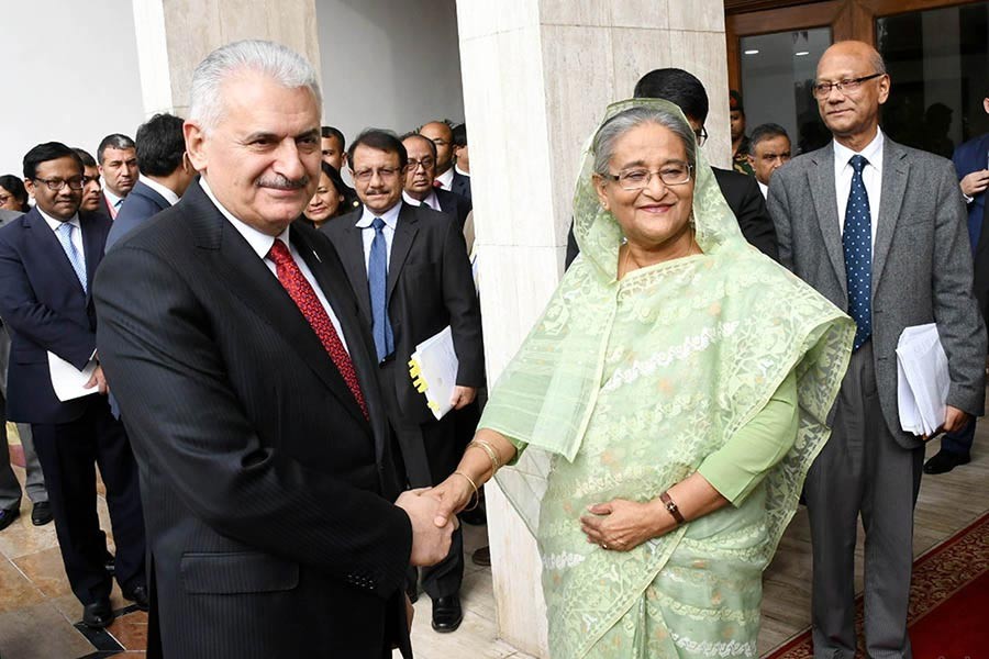 Prime Minister Sheikh Hasina receives her Turkish counterpart Binali Yildirim at the Prime Minister's Office in Dhaka on Tuesday. -Focus Bangla Photo