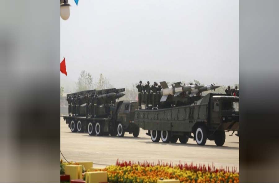 Soldiers ride military vehicles during a parade to mark the 70th anniversary of Armed Forces Day in Myanmar's capital Naypyitaw, March 27, 2015. Reuters.