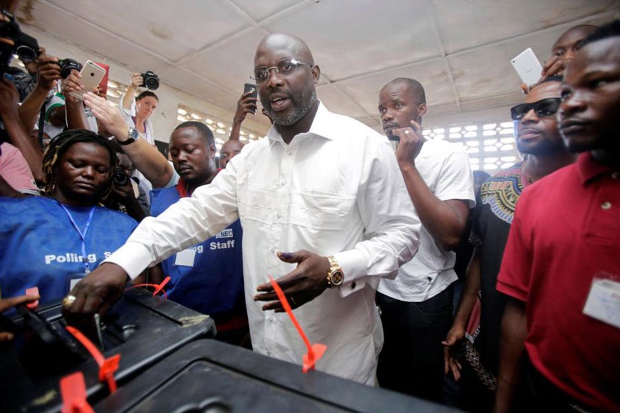 Former international footballer George Weah. (Reuters photo)