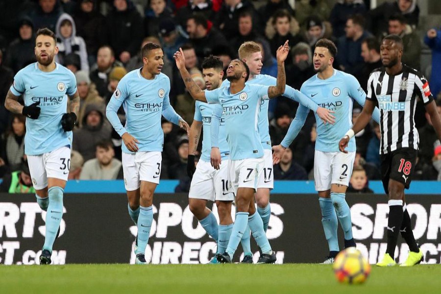 Manchester City's Raheem Sterling celebrates scoring a goal during the English Premier League football match between Manchester City and Newcastle United on Wednesday. 	— Reuters