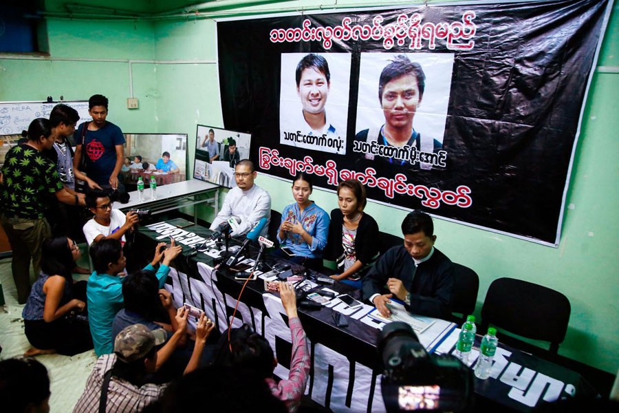 Pan Ei Mon (C-L), wife of Reuters reporter Wa Lone and Nyo Nyo Aye (C-R), sister of Reuters reporter Kyaw Soe Oo attend a news conference in Yangon, Myanmar, December 28, 2017. Reuters