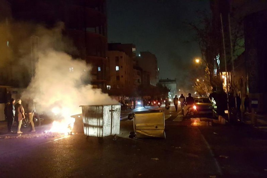 People protest in Tehran, Iran on Saturday in this picture obtained from social media. - via Reuters