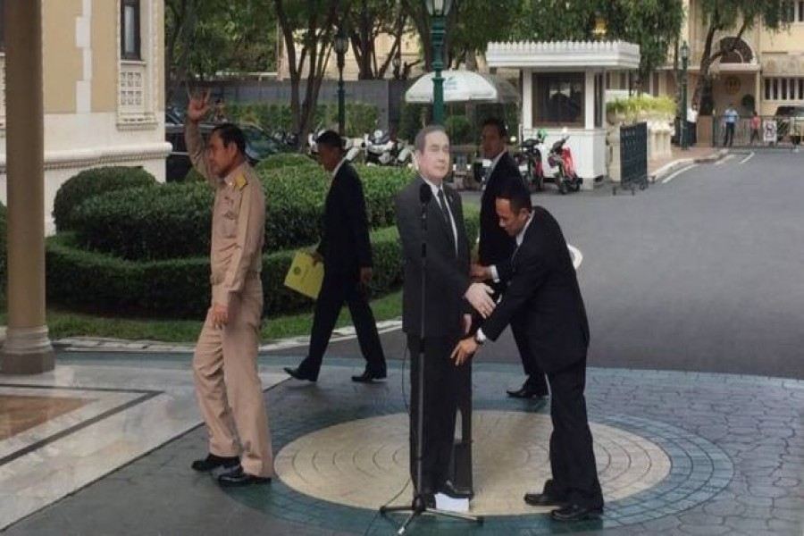 Thai PM puts up replica to get around questions