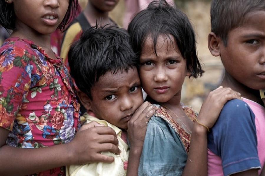 Rohingya refugee children, hailing from Myanmar’s state of Rakhine, queue for aid in Cox's Bazar, Bangladesh, September 21, 2017. Reuters/File Photo