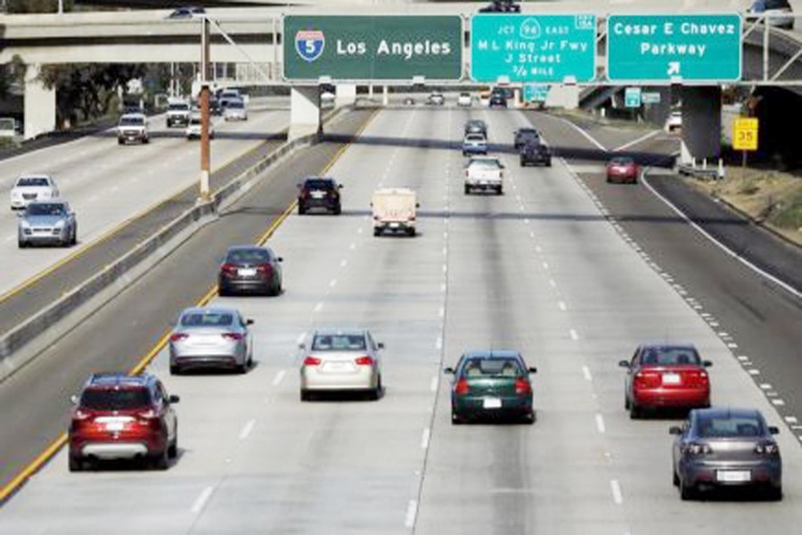 Cars travel north towards Los Angeles on interstate highway 5 in San Diego, California.	— Reuters