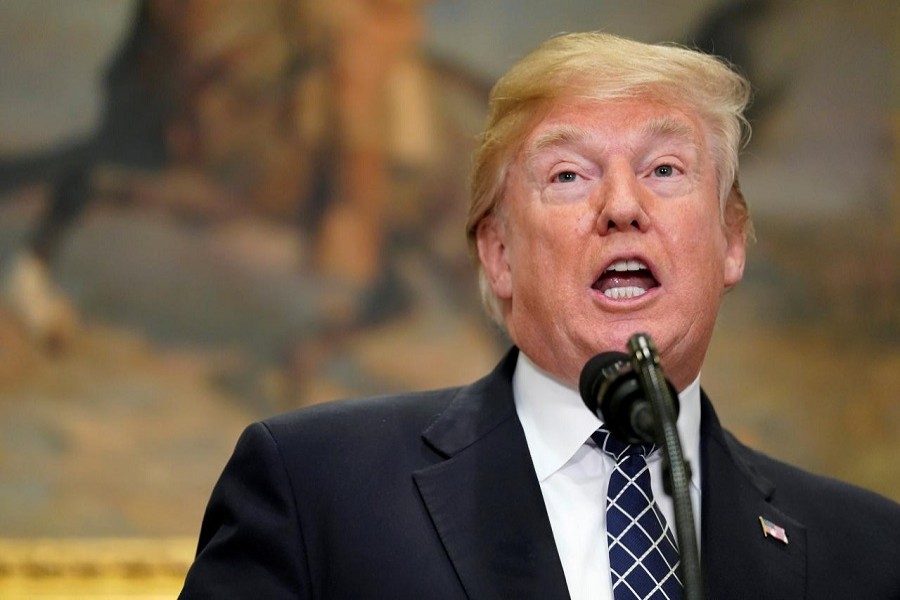 US President Donald Trump speaks before signing a proclamation to honour Martin Luther King Jr. day in the Roosevelt Room of the White House in Washington, US, January 12, 2018. Reuters