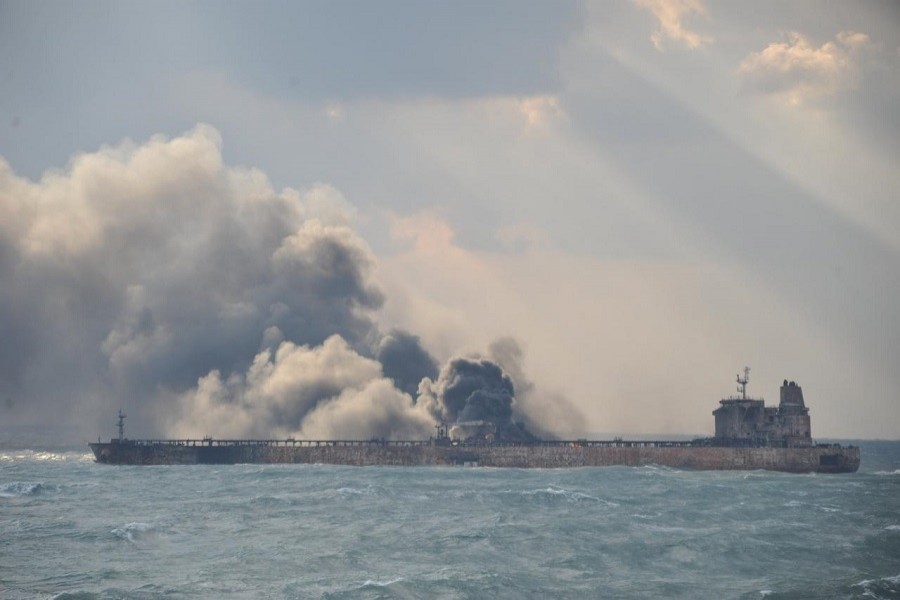 Flames and smoke from the Iranian oil tanker Sanchi is seen in the East China Sea, on January 15, 2018. Handout via Reuters