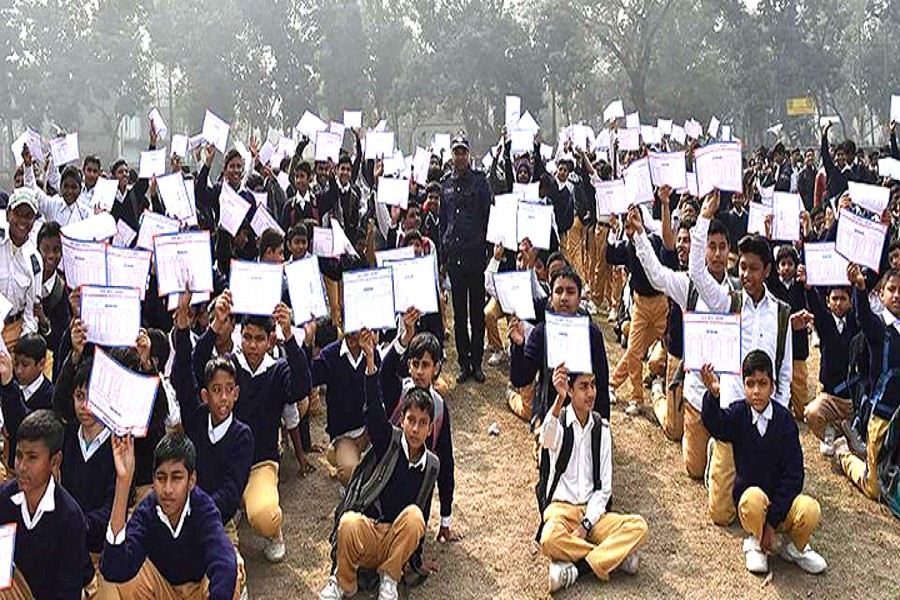 GAIBANDHA: Students of Gaibandha Government Boys' High School hold their class routines as they received those from the district police super on Wednesday.  	— FE Photo