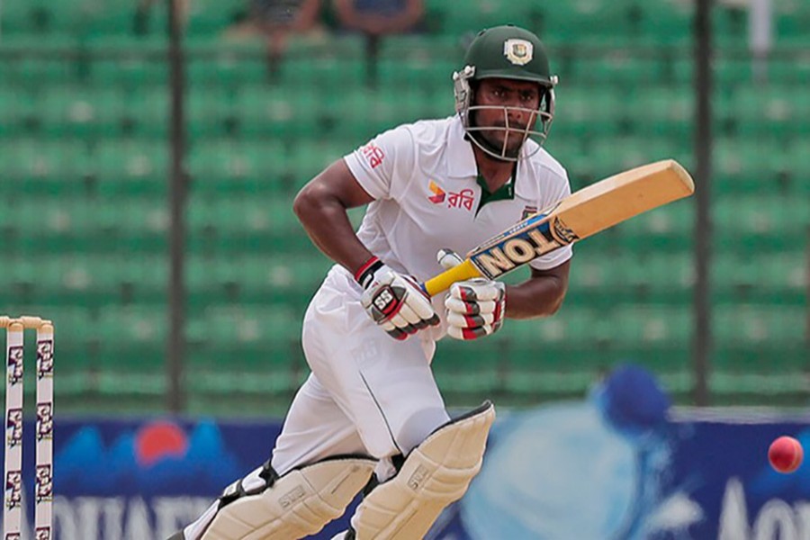 AP file photo shows Bangladeshi opener Imrul Kayes in action.