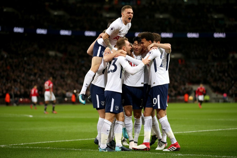 Tottenham's Christian Erikson celebrates with teammates after scoring their first goal during the Premier League football match against Manchester United at Wembley Stadium, London in Britain on Wednesday.	— Reuters