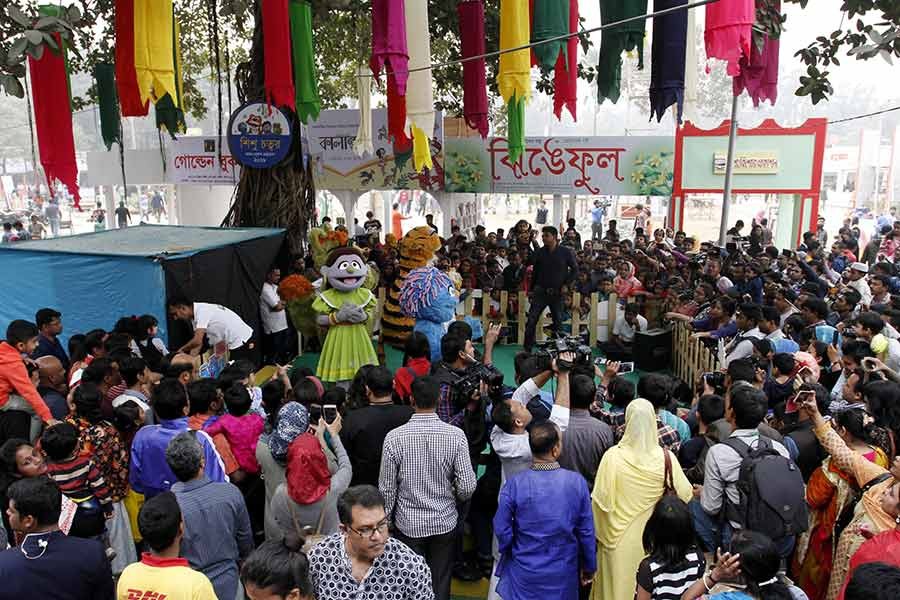 A large number of visitors gather at an area dedicated for children at the Amar Ekushey Granthamela-2018 on Friday.