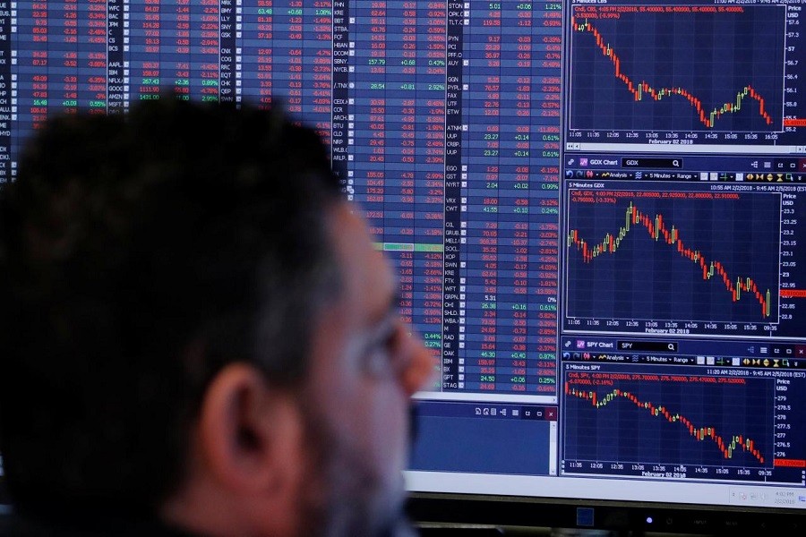 A trader works on the floor of the New York Stock Exchange shortly after the closing bell in New York, US, February 2, 2018. Reuters