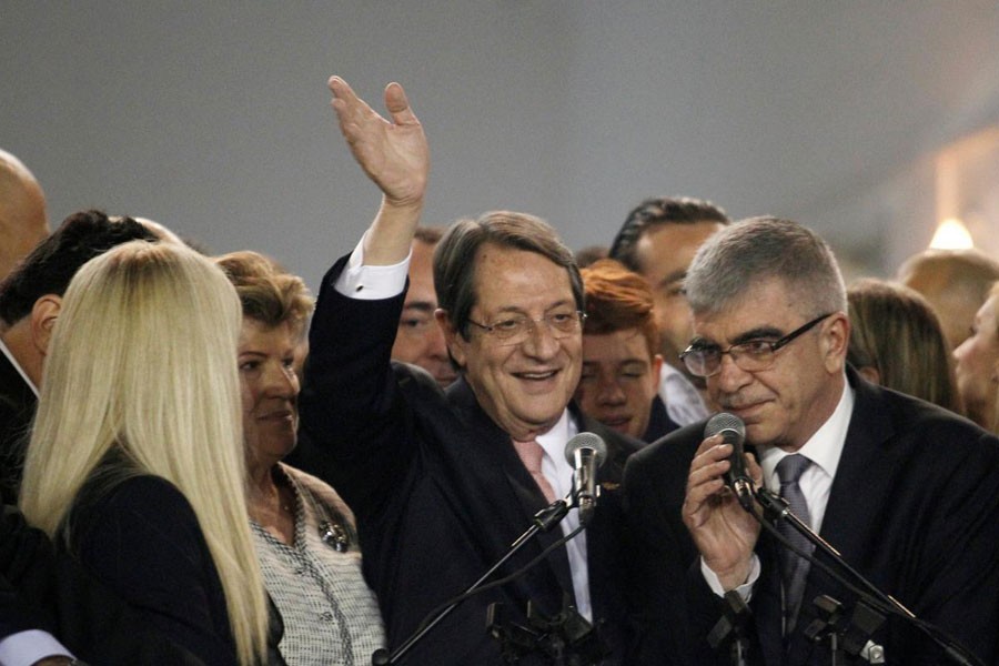 Newly elected president Nicos Anastasiades greets his supporters during a proclamation ceremony after the second round of the presidential election, at Eleftheria Hall in Nicosia, Cyprus, February 4, 2018. (REUTERS)