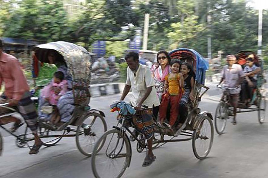 Slow moving rickshaws choking traffic   