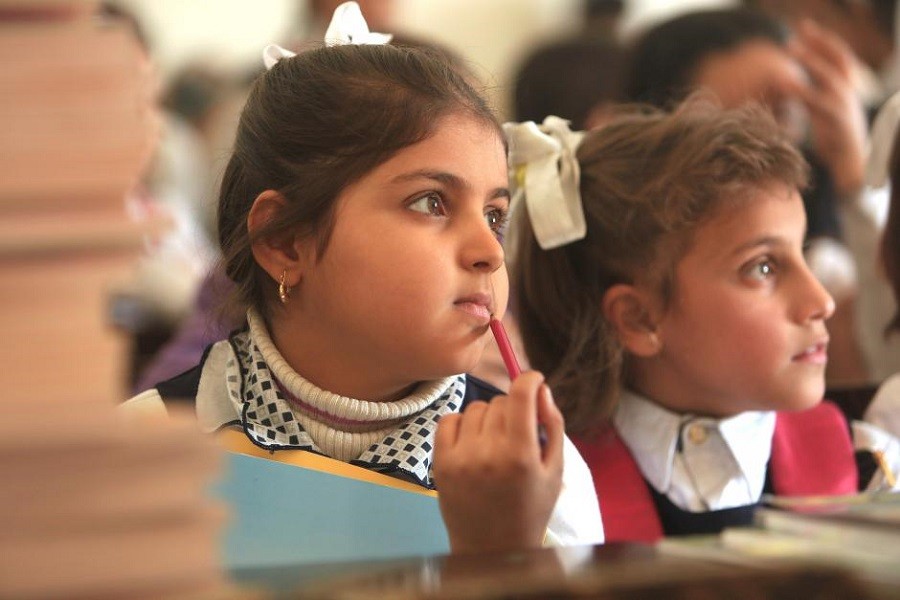 Students attend classes after the city was recaptured from the Islamic State militants in Qayyara, Iraq, November 17, 2016. Reuters/File Photo