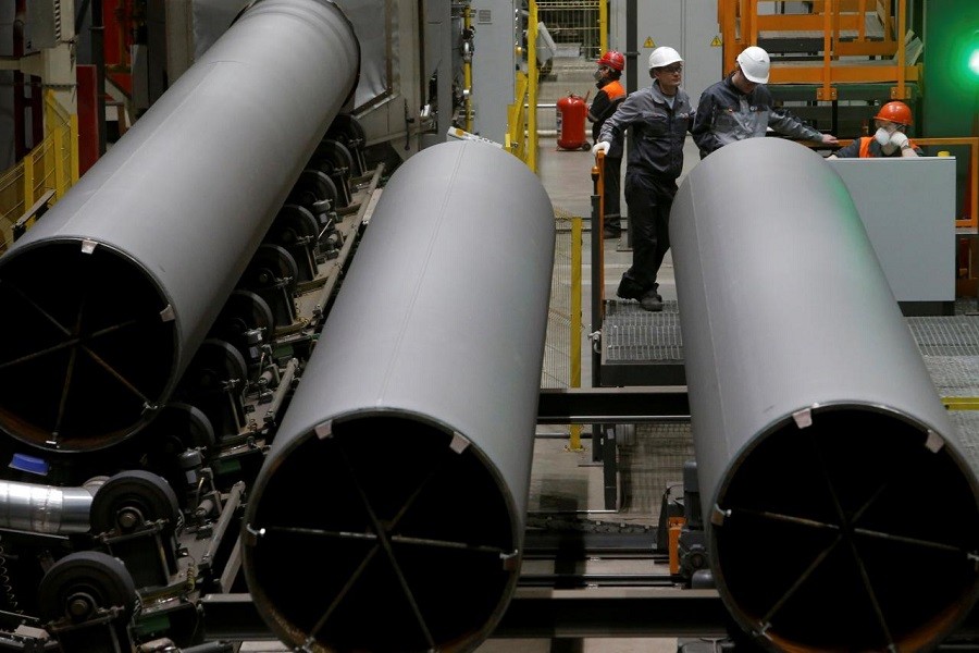 Men are seen at work at Zagorsk Pipe Plant (ZTZ), which launched the production of large-diameter pipes for Russian gas giant Gazprom, outside Moscow, Russia May 29, 2017. Reuters/File Photo