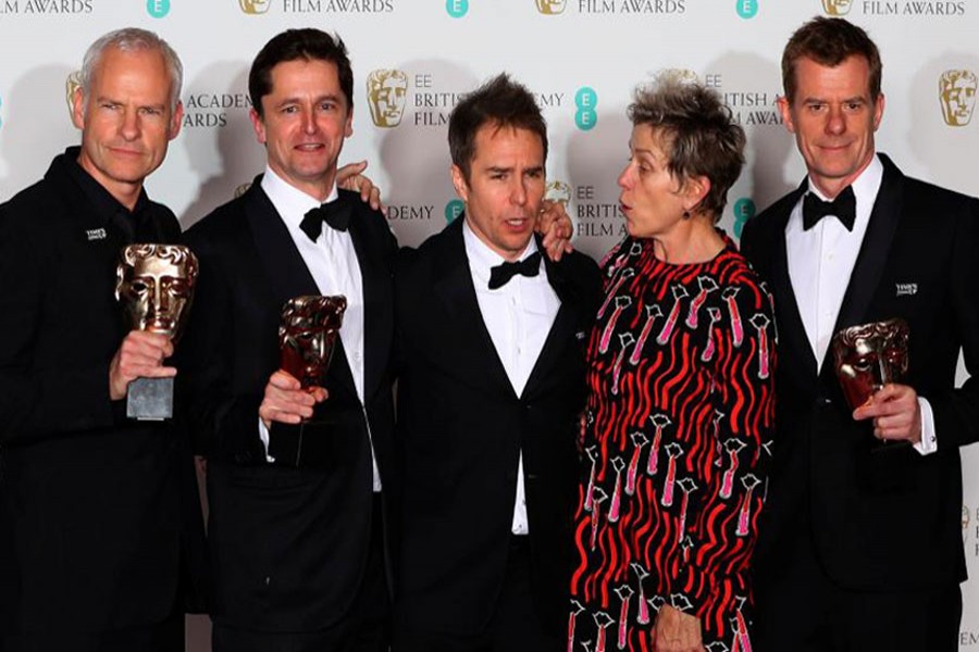 Martin McDonagh, Peter Czernin, Sam Rockwell and Graham Broadbent, Frances McDormand, hold their trophies for Best Film 'Three Billboards Outside Ebbing Missouri' at BAFTA Film Awards.-Reuters Photo