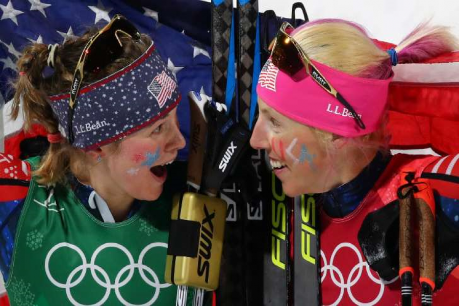 Jessica Diggins and Kikkan Randall of the U.S. celebrate