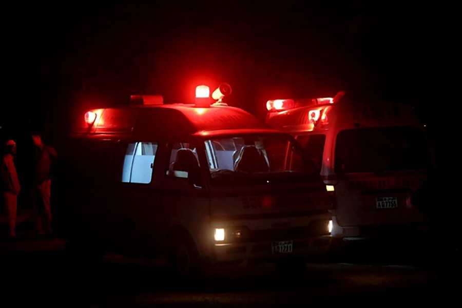 Ambulances are seen after evacuating injured civilians from the scene of an explosion near the Presidential palace in Mogadishu of Somalia on late Friday. -Reuters Photo