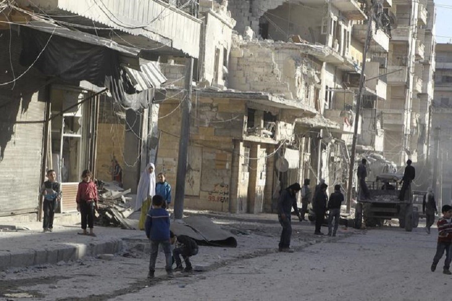 Residents inspect damage after an airstrike on the rebel- held al-Fardous neighbourhood of Aleppo, Syria February 18, 2016. Reuters/Files