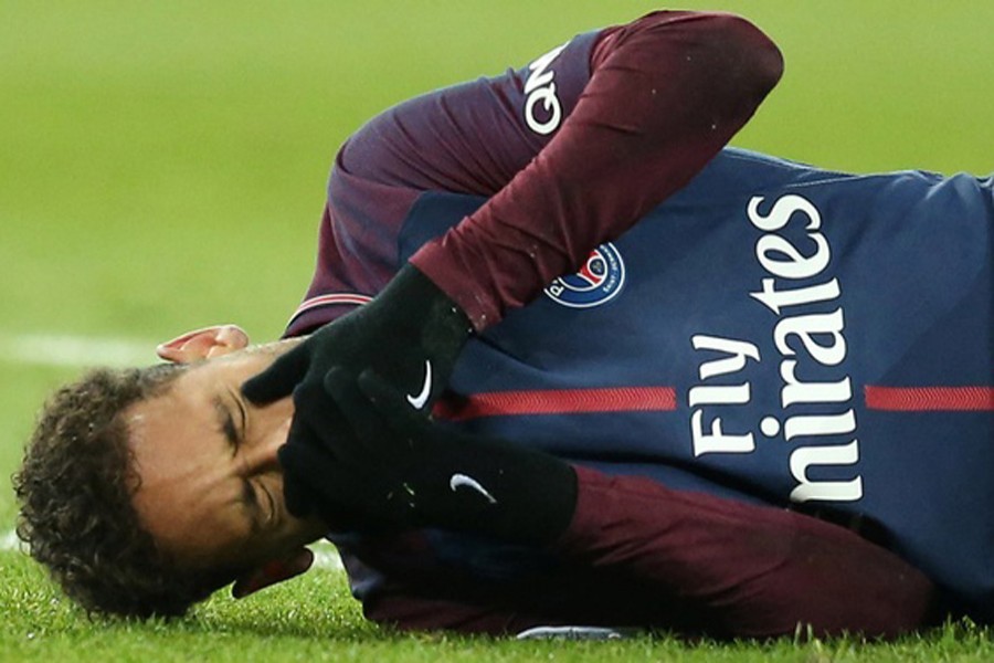 Paris Saint-Germain’s Neymar lies on the pitch after sustaining an injury during the Feb 25 match against Olympique de Marseille. Reuters/File Photo